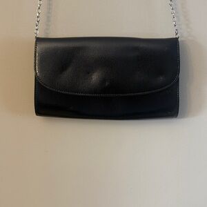 Black Chain Strap Clutch. 6 card holder spots inside. Outside pocket in back.